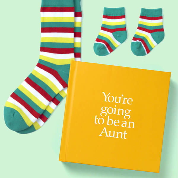 A lovely book to give a soon-to-be aunt, with socks for her and socks for the baby. 