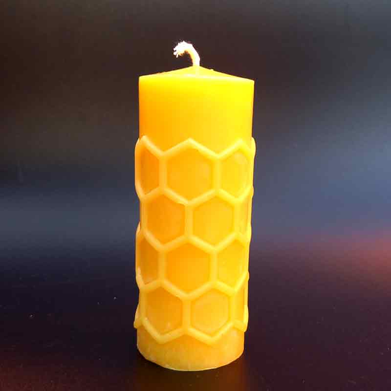 100% pure beeswax pillar candle with honeycomb pattern