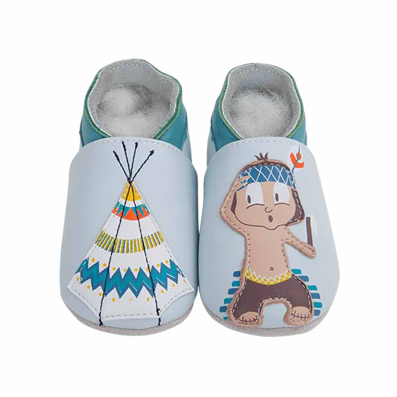 Soft baby and childs slippers in leather with a cute red indian decoration.