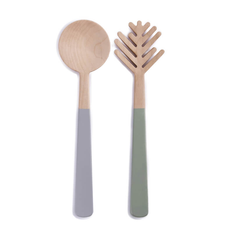 A pair of slightly matching wooden serving spoons, one normal, one the shape of a stylised branch. 