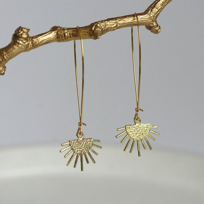 Starburst brass earrings